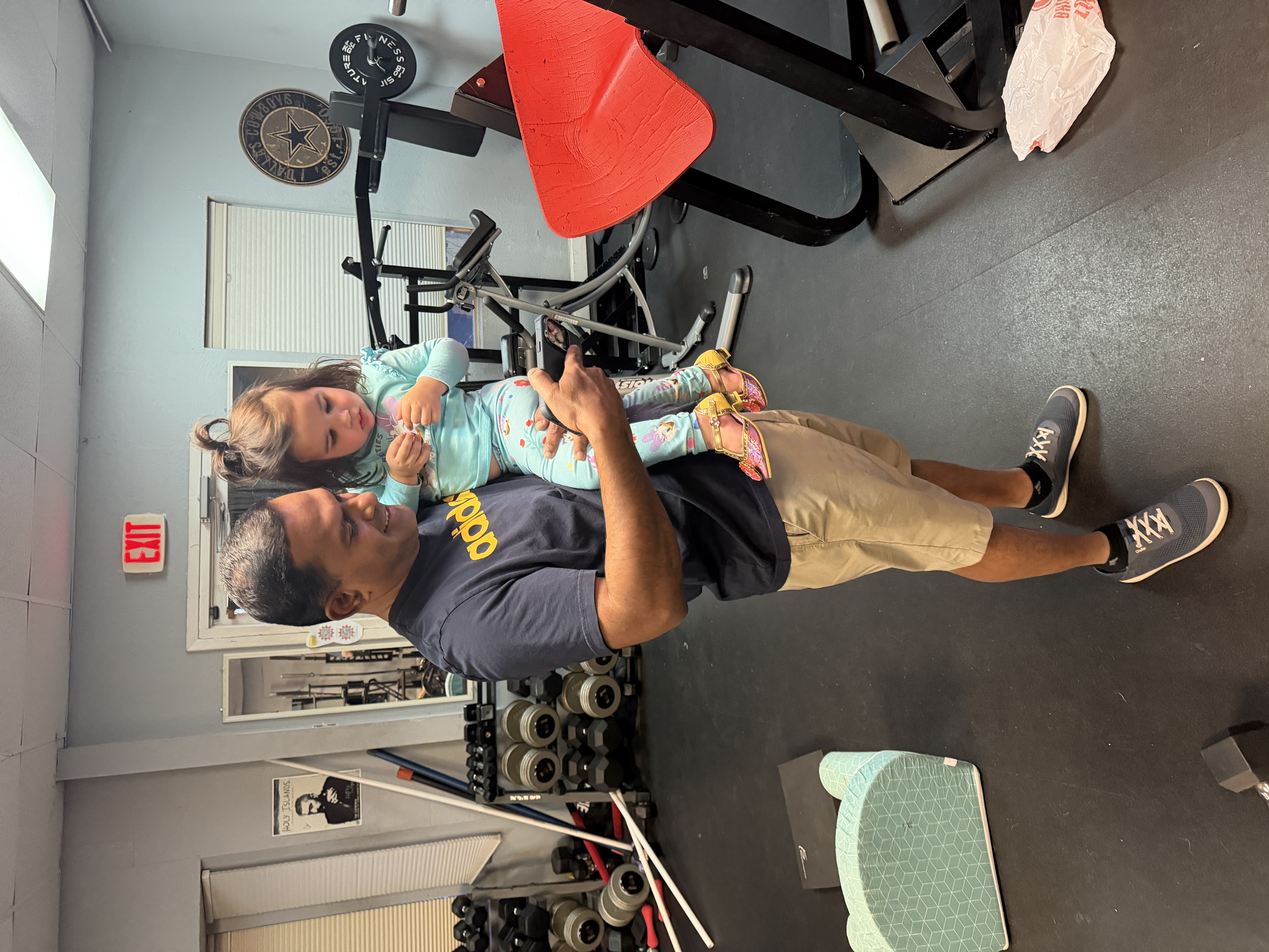 Family-friendly moment inside the PowerHouseATX private gym